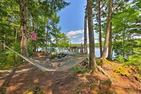 Calm Waterfront Great Pond Cottage with Hot Tub Deck