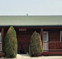 Wolf Den Log Cabin Motel and RV Park - Accommodation Dallas