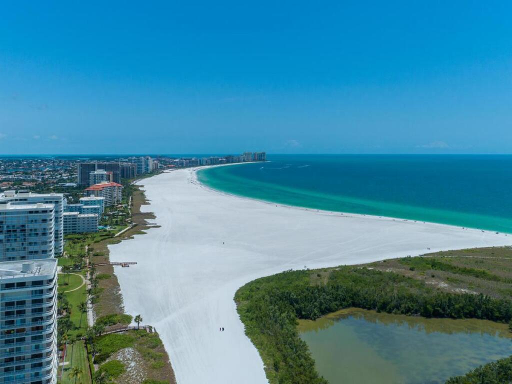 NEW OWNERS! End Unit W/ Top Of Line Finishes / Wide Gulf Views! - thumb 3