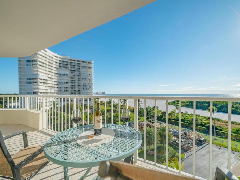 NEW OWNERS! End Unit W/ Top Of Line Finishes / Wide Gulf Views! - thumb 2